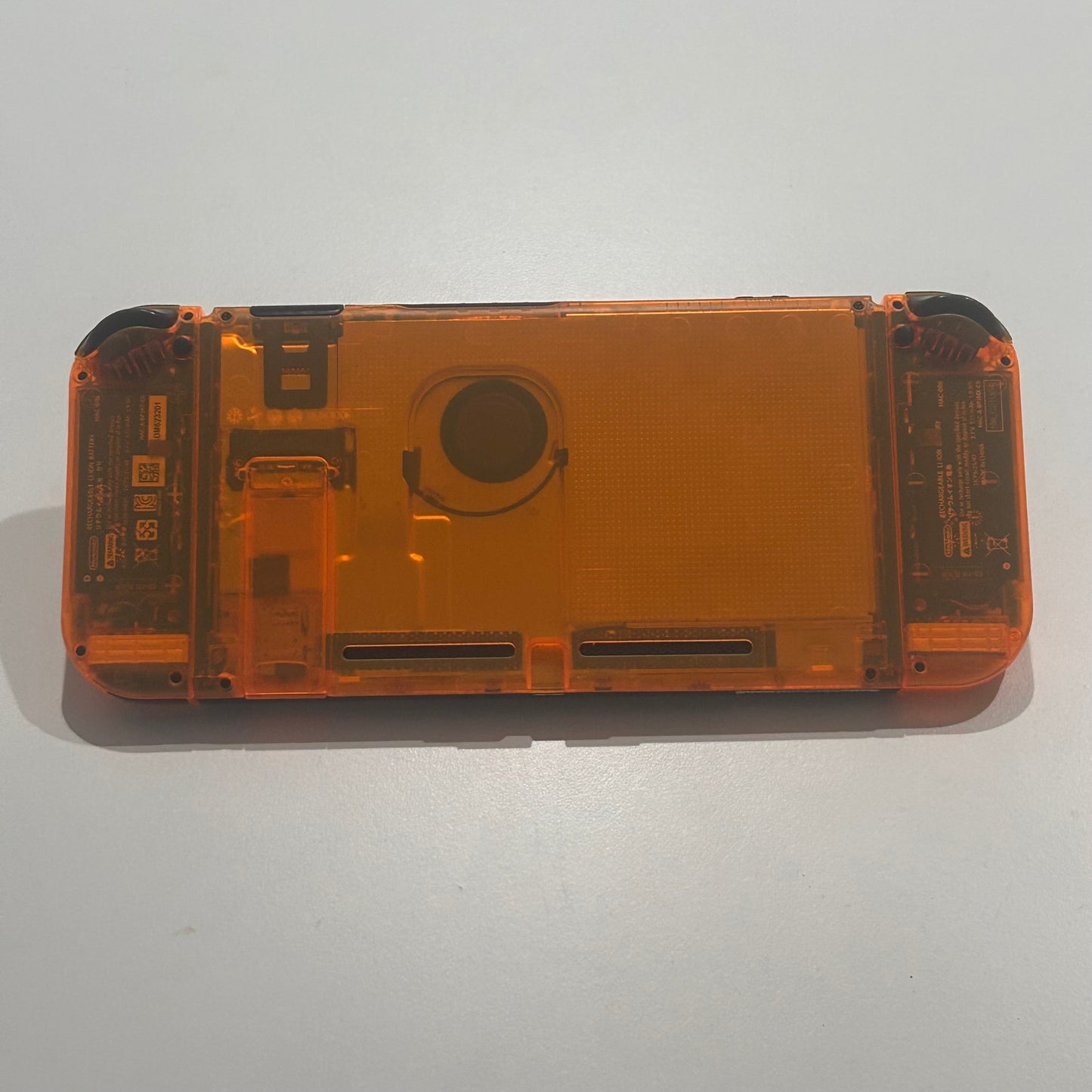 Clear Orange Nintendo Switch (E-SHOP Banned)