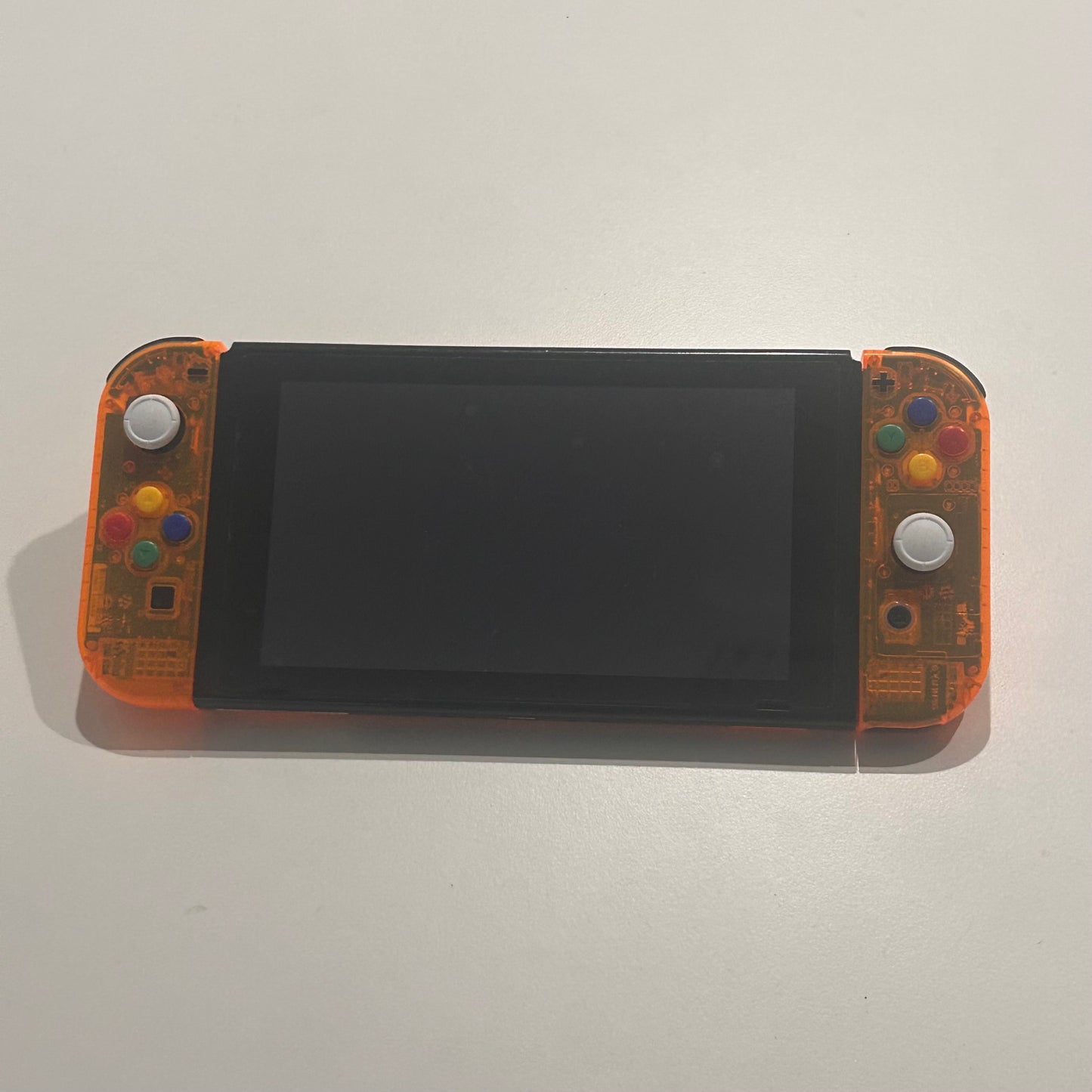 Clear Orange Nintendo Switch (E-SHOP Banned)