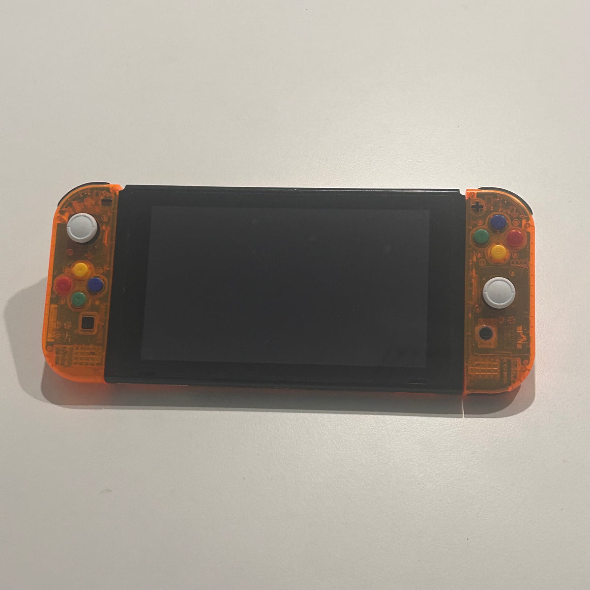 Clear Orange Nintendo Switch (E-SHOP Banned)