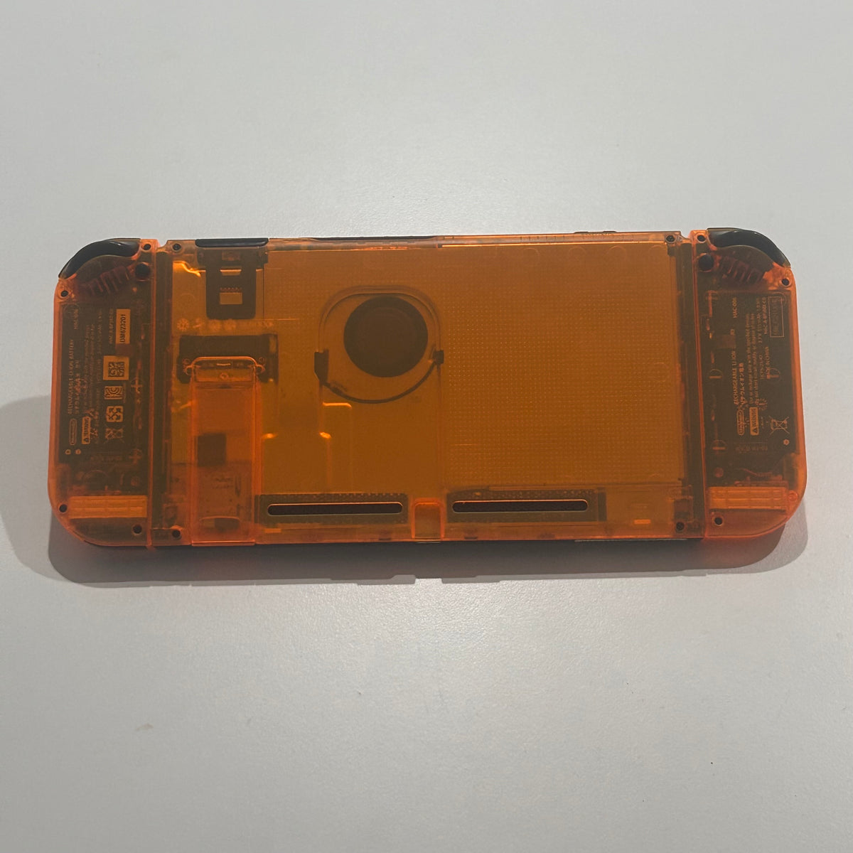 Clear Orange Nintendo Switch (E-SHOP Banned)